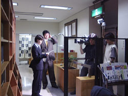 �}�����ł̎B�e���i�̉摜